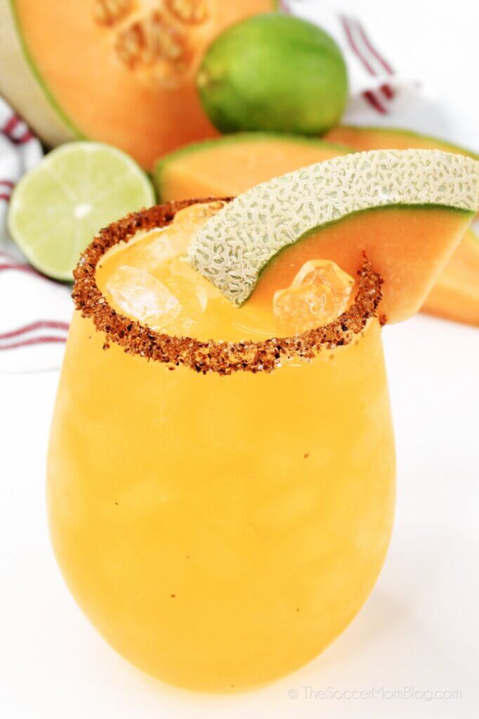 Completed Cantaloupe Margaritas with fruit in background