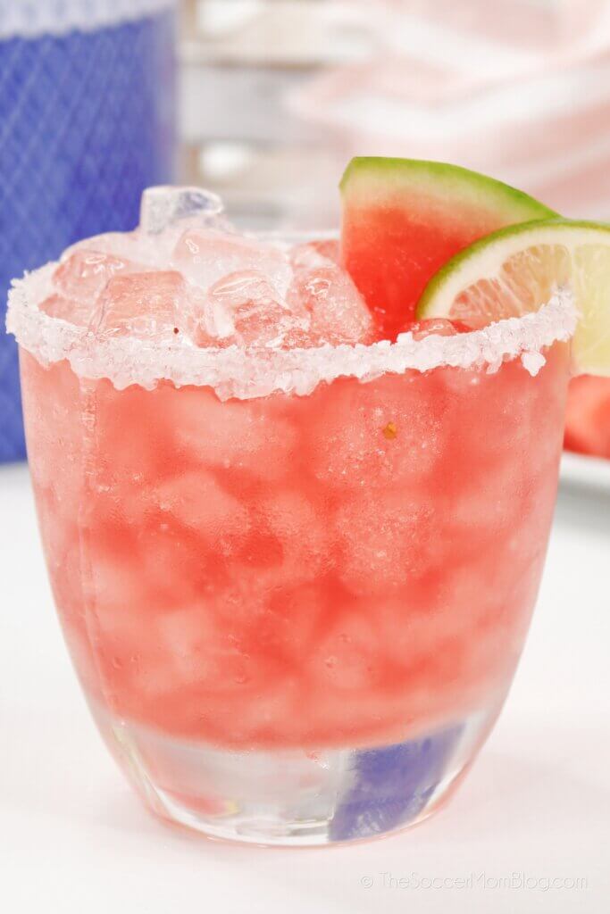 Completed Watermelon Margarita, with lime and watermelon wedge