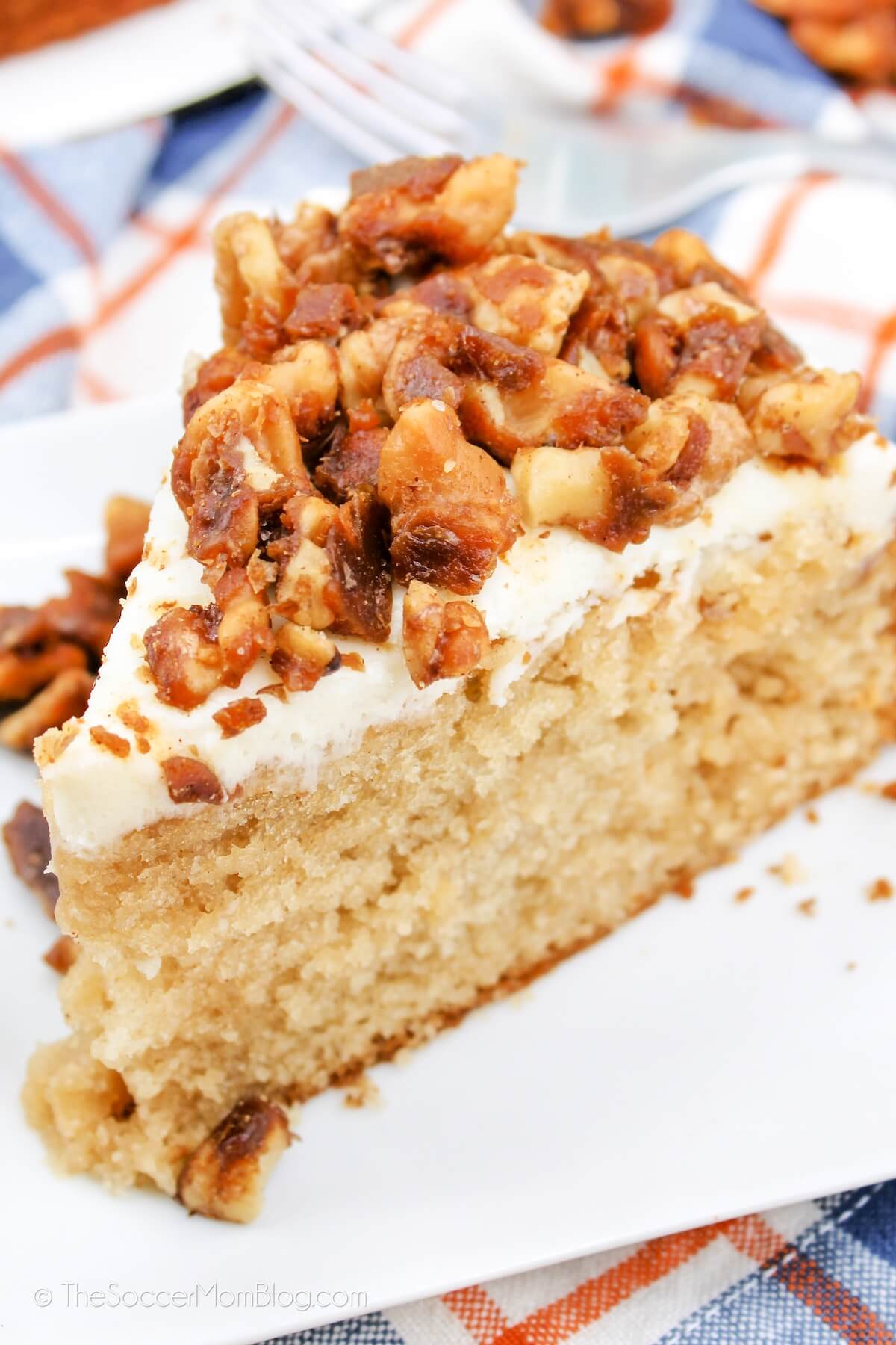 slice of cinnamon fireball cake with candied pecans on top