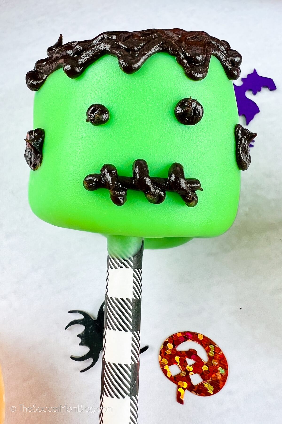 marshmallow pop decorated to look like Frankenstein