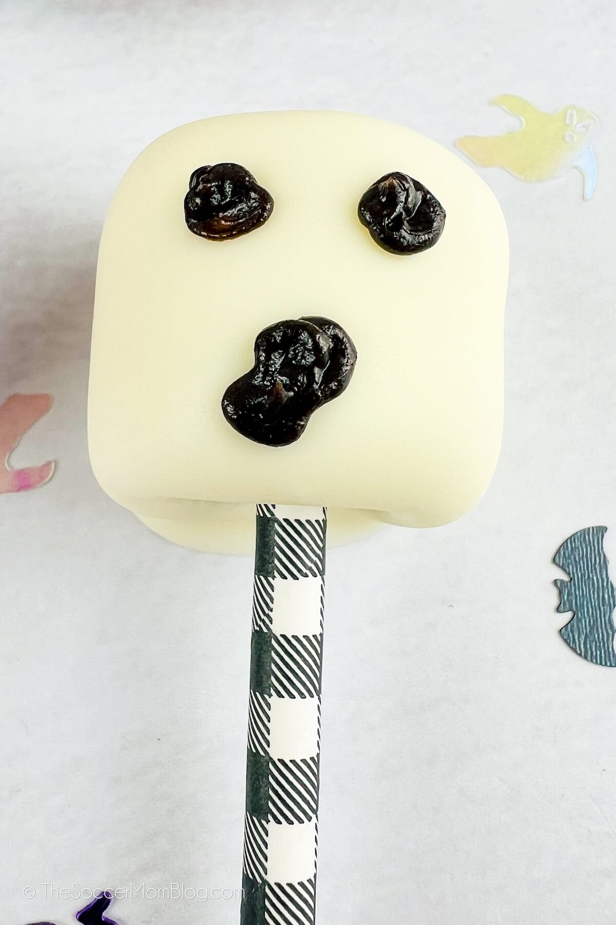 marshmallow pop decorated to look like a ghost