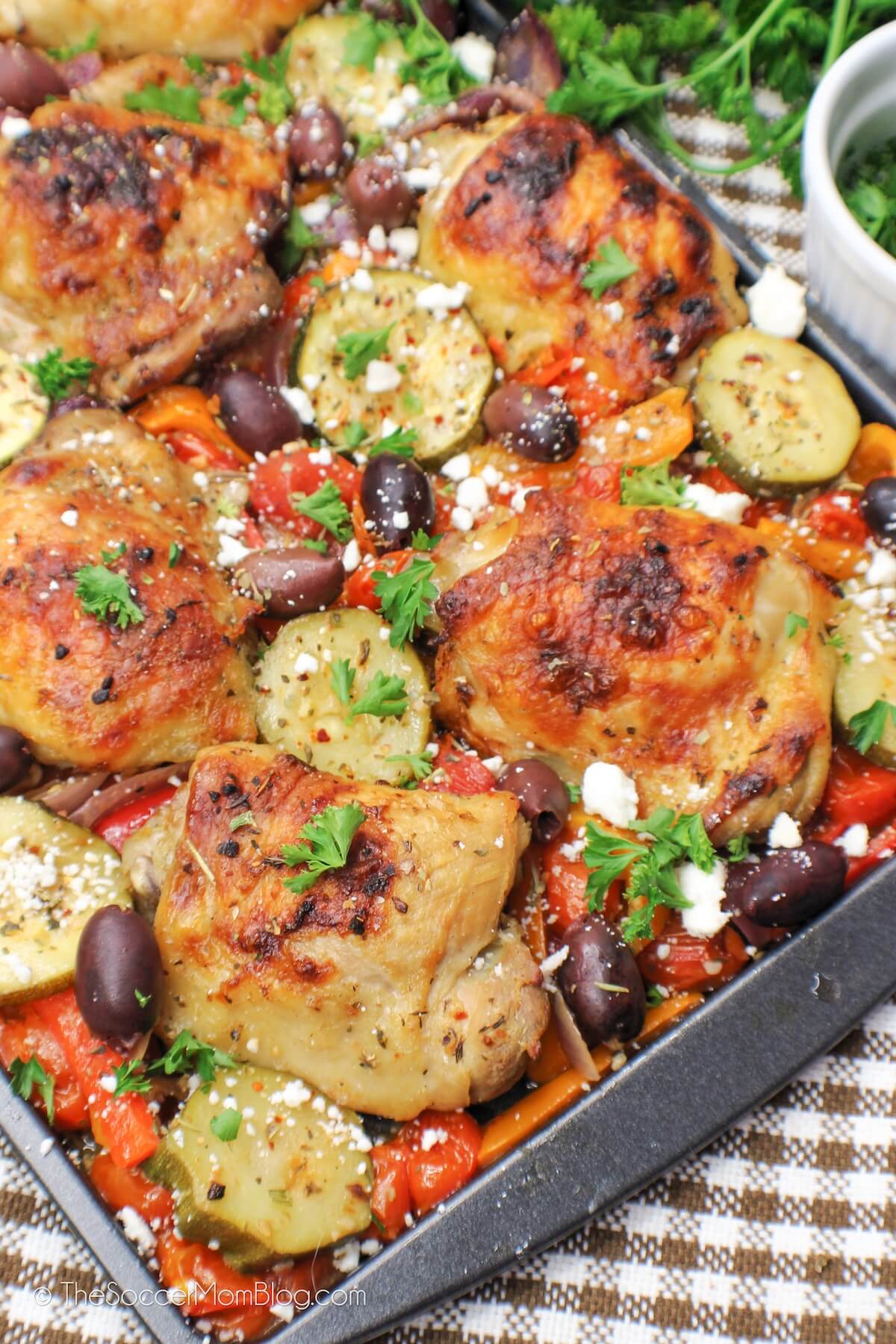 Greek chicken sheet pan dinner with roasted veggies