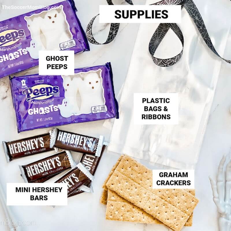 supplies needed to make Halloween smores, with text labels