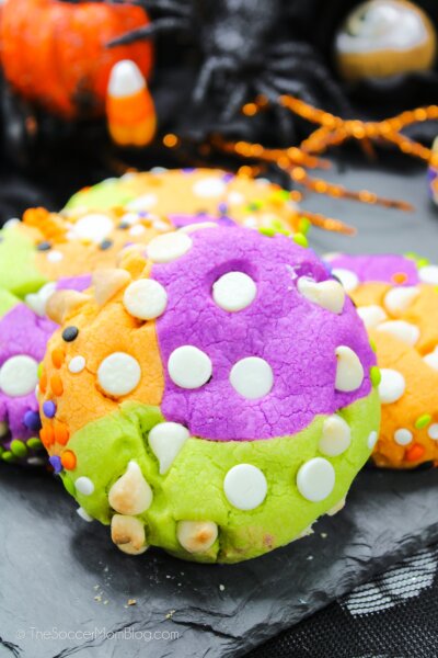 colorful orange, green, and purple Halloween sprinkle cookies