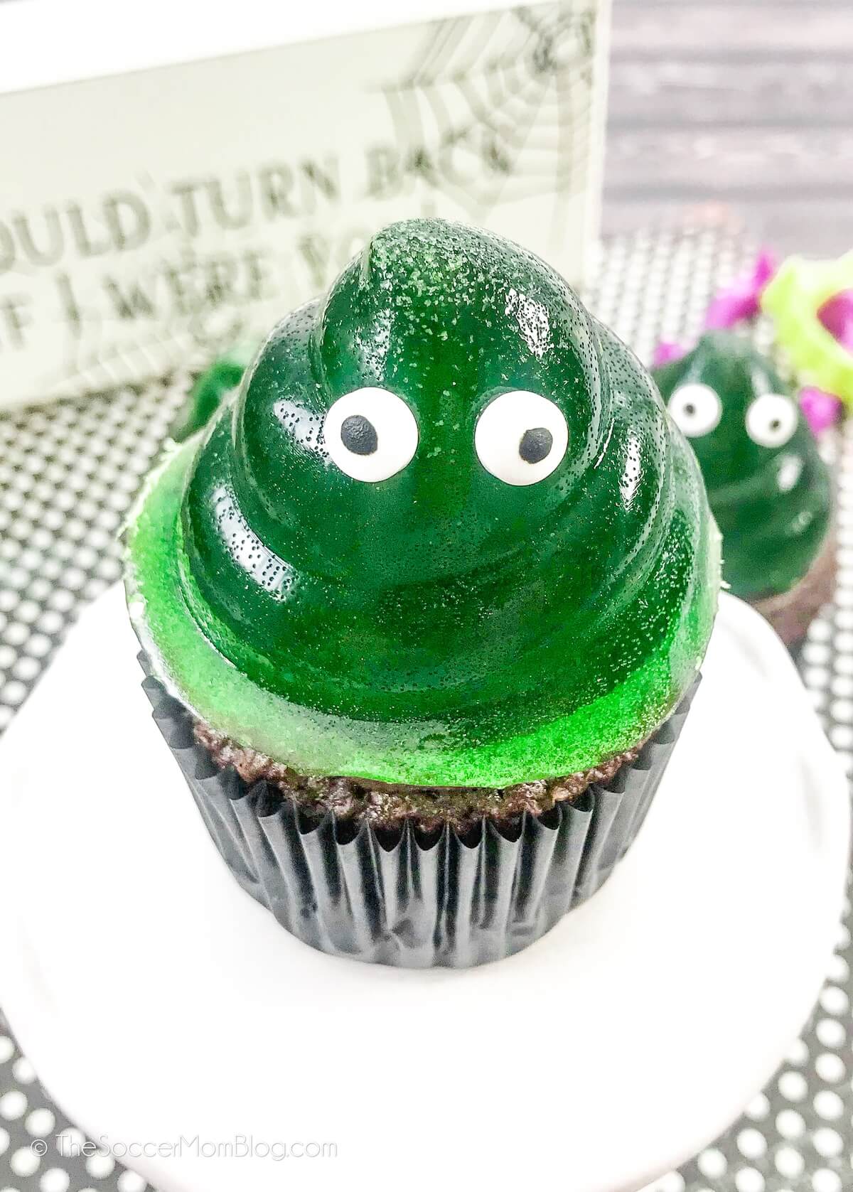 slime cupcake with green jello swirl on top