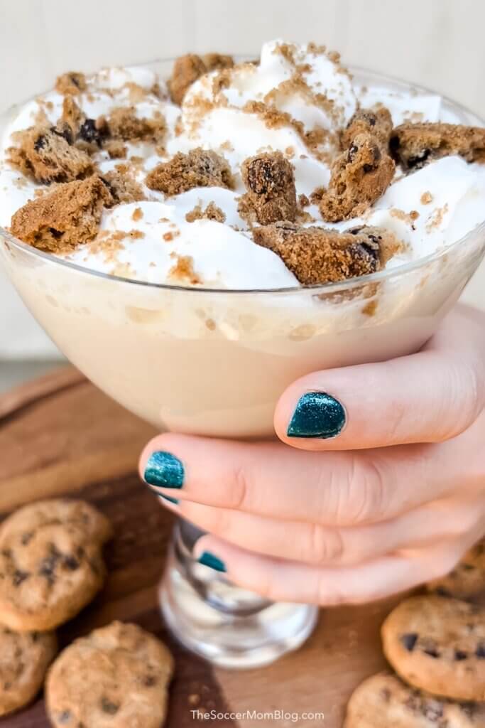 holding a cookie martini in hand