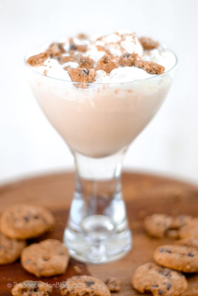chocolate chip cookie martini surrounded by cookies