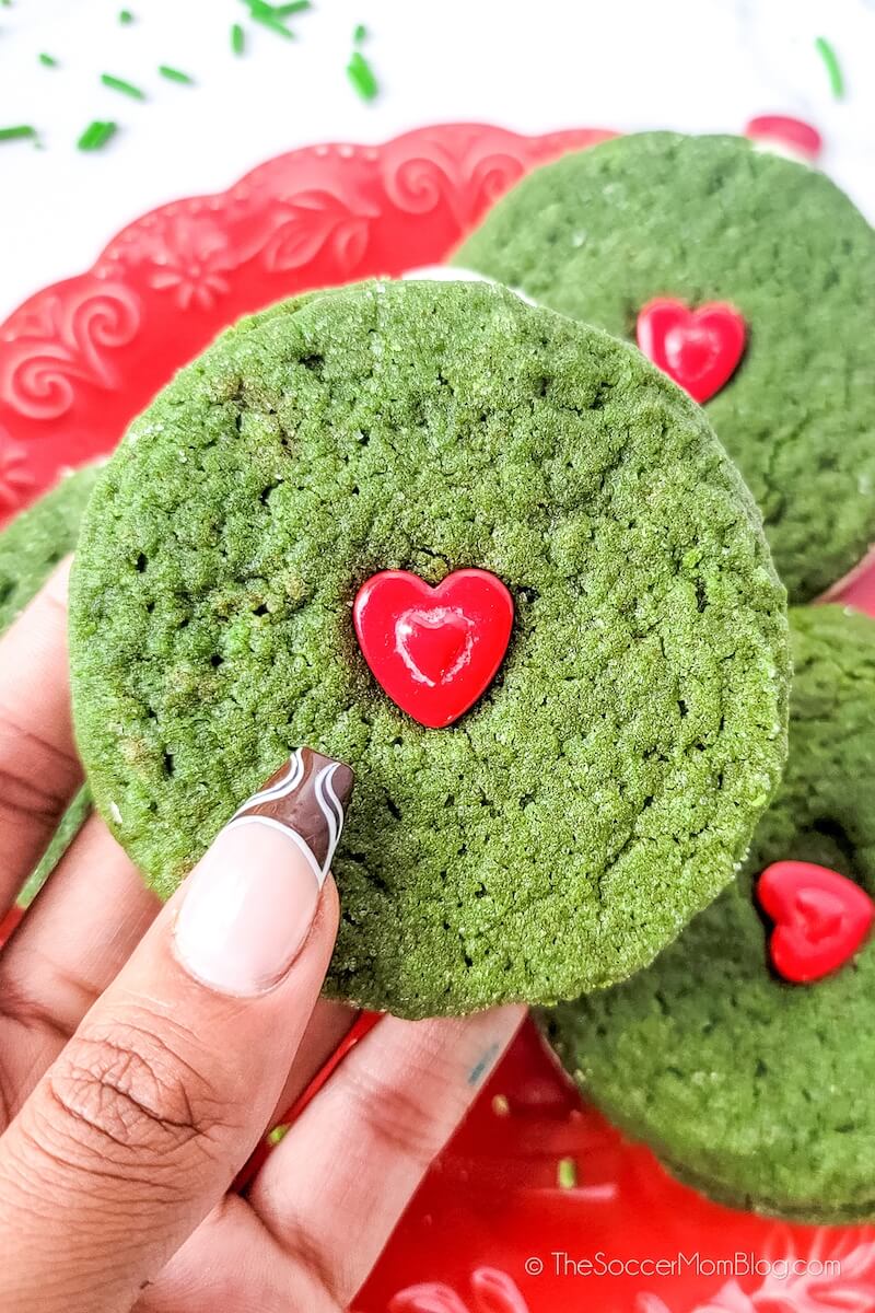 hand holding a Grinch Ginger Cookie Sandwich