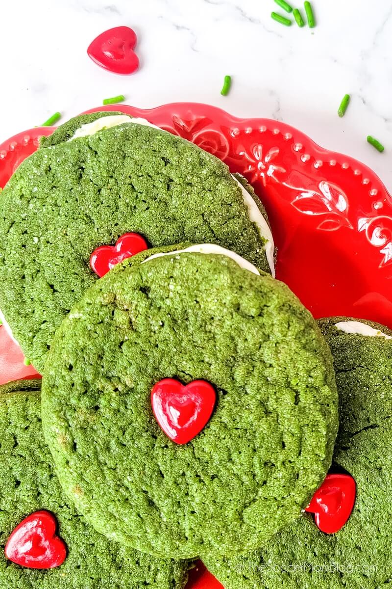 A plate of Grinch Ginger Cookie Sandwiches