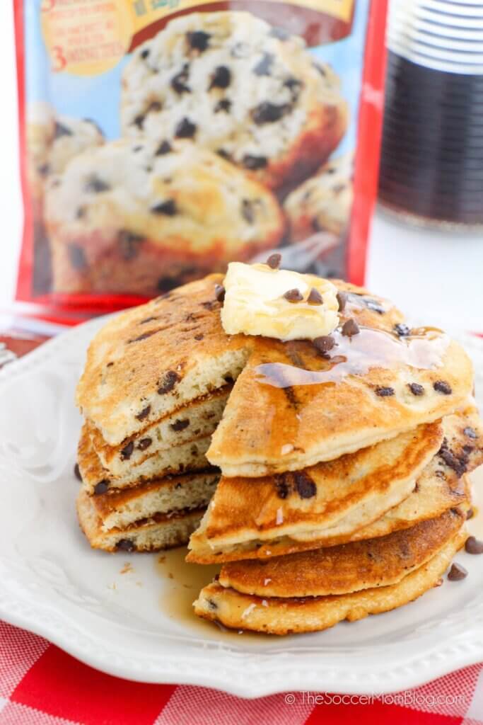 stack of chocolate chip pancakes with bite missing