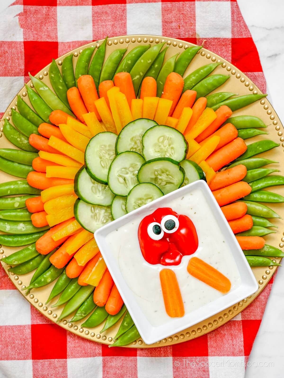 turkey vegetable platter on a red tablecloth