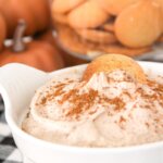 pumpkin fluff dip with cookie in it, and a bowl of vanilla wafers