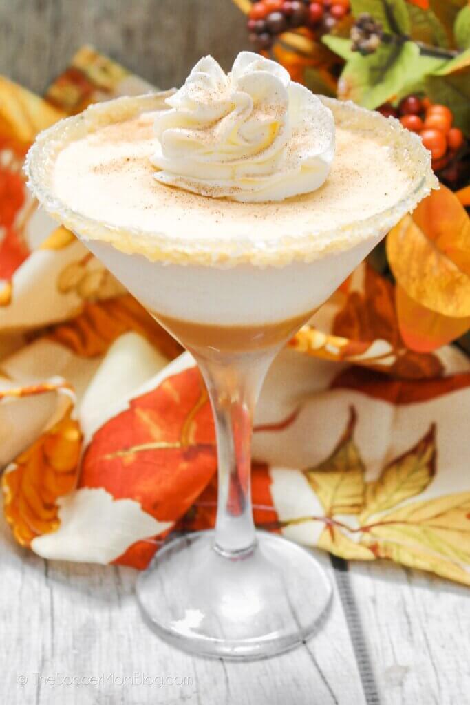 pumpkin spice martini with caramel and whipped cream