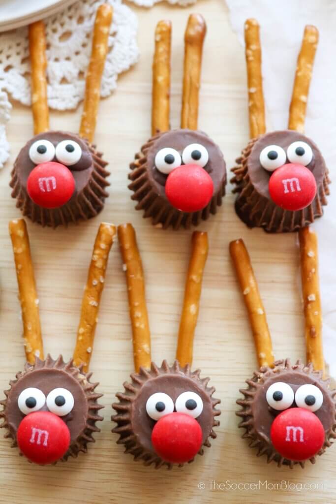 candy reindeer made with peanut butter cups and pretzel sticks