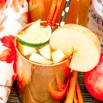 apple cider Moscow mule with fresh apple pieces