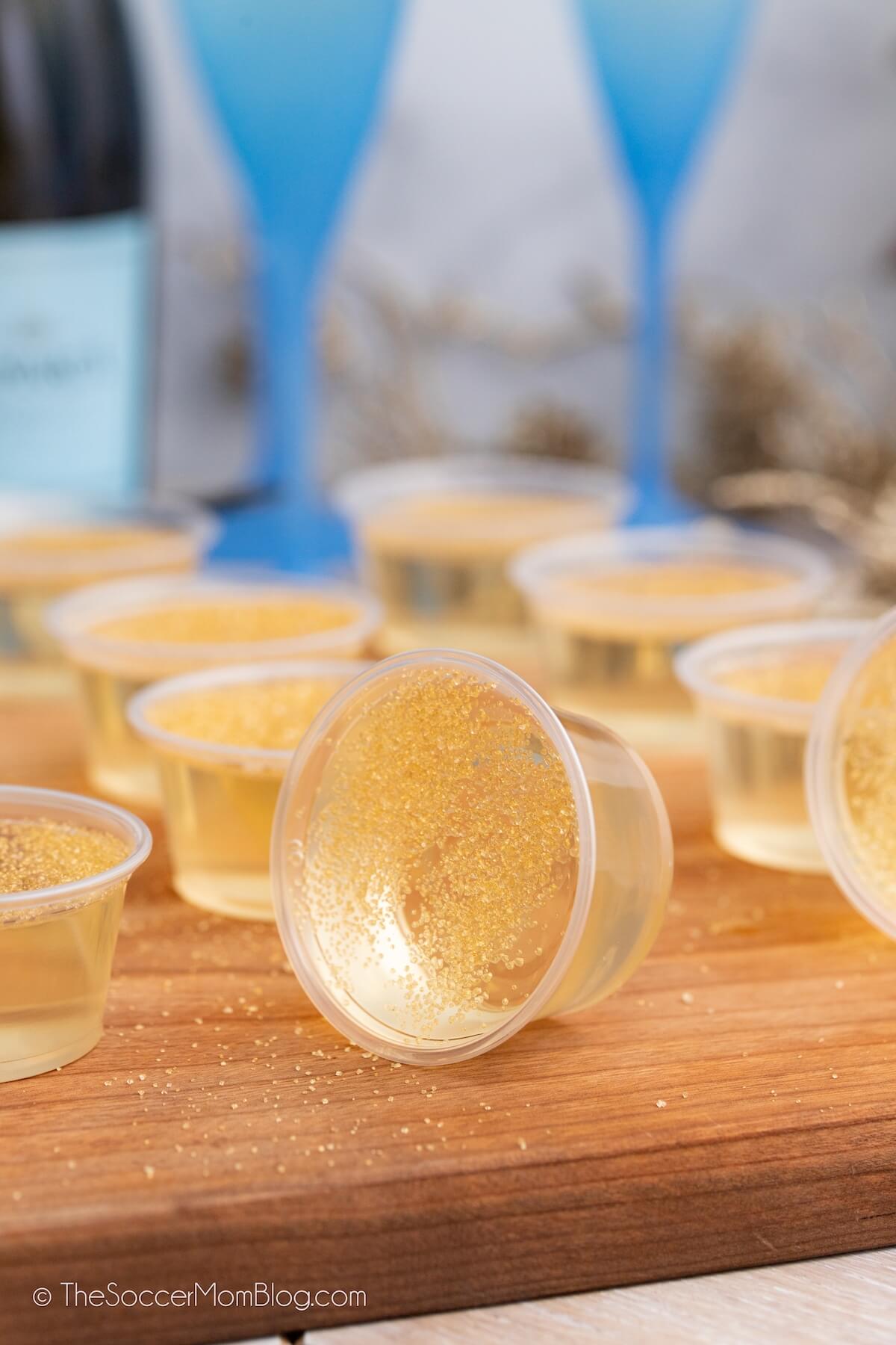 gold colored jello shots made with champagne
