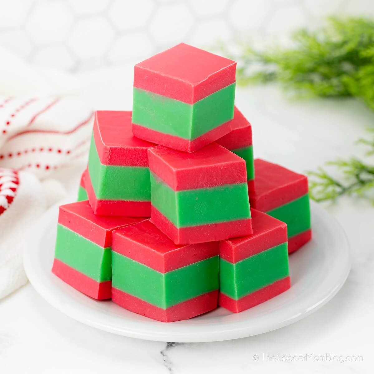 red and green Christmas fudge piled on a serving plate