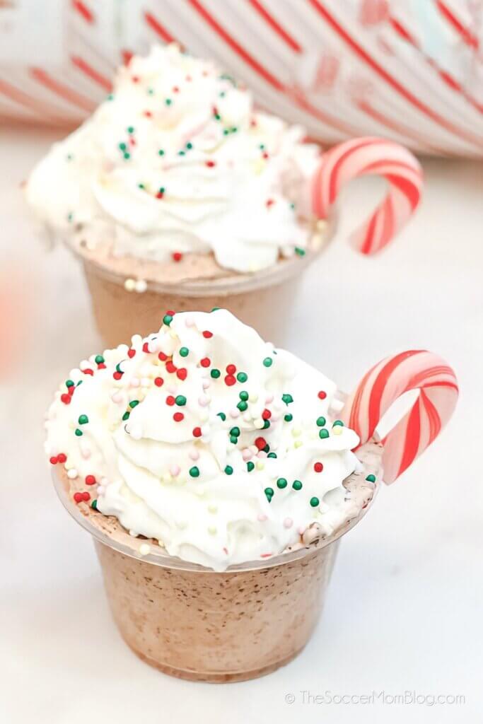 Christmas hot chocolate pudding shots, with candy canes
