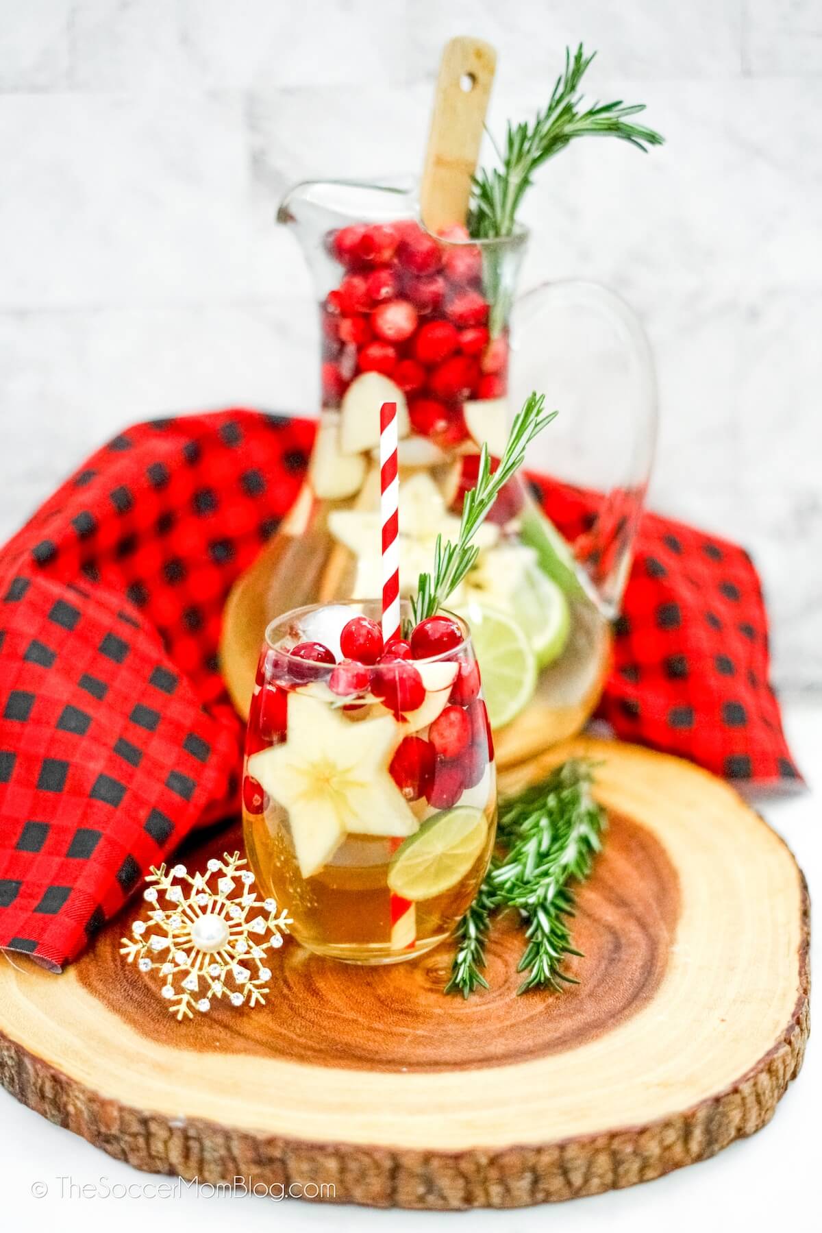 pitcher of holiday white sangria, with a full glass