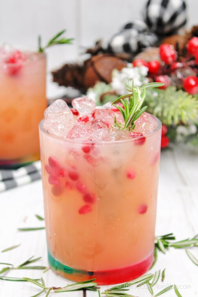 Holiday Paloma Cocktail made with rosemary and pomegranate