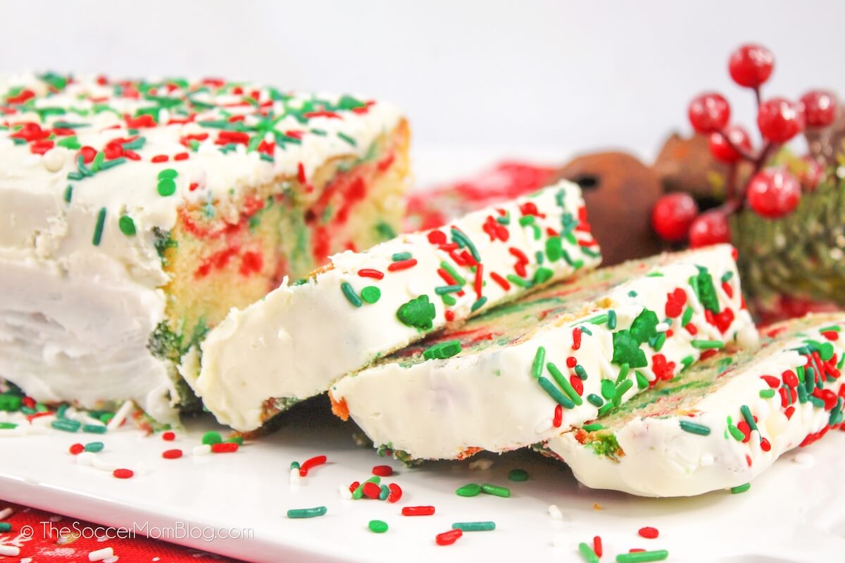 holiday loaf cake with frosting and Christmas sprinkles
