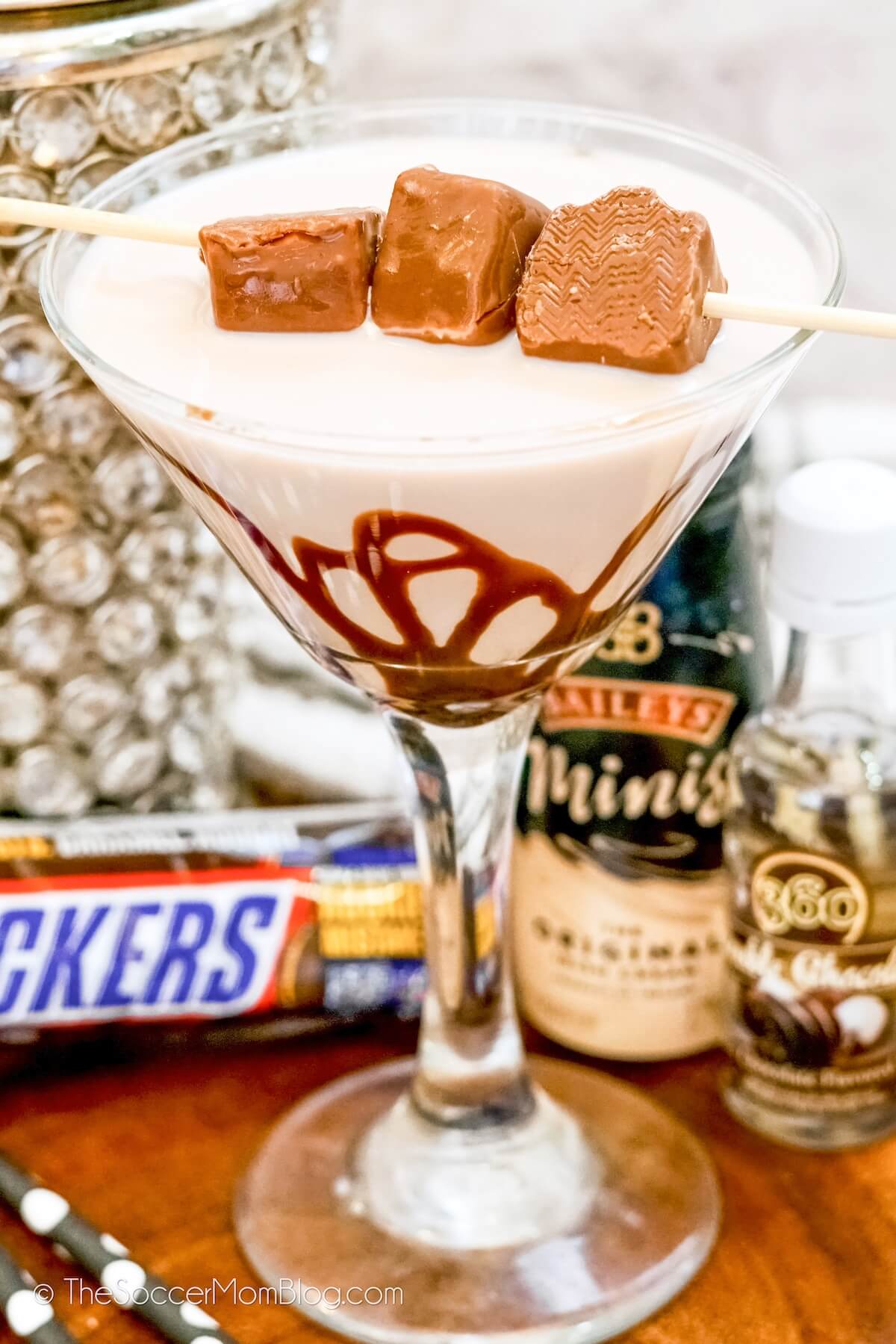 Snickers martini with ingredients in background