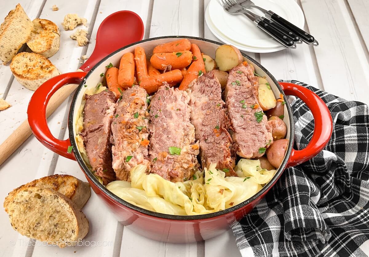 Dutch Oven filled with Corned Beef, cabbage, carrots, and potatoes