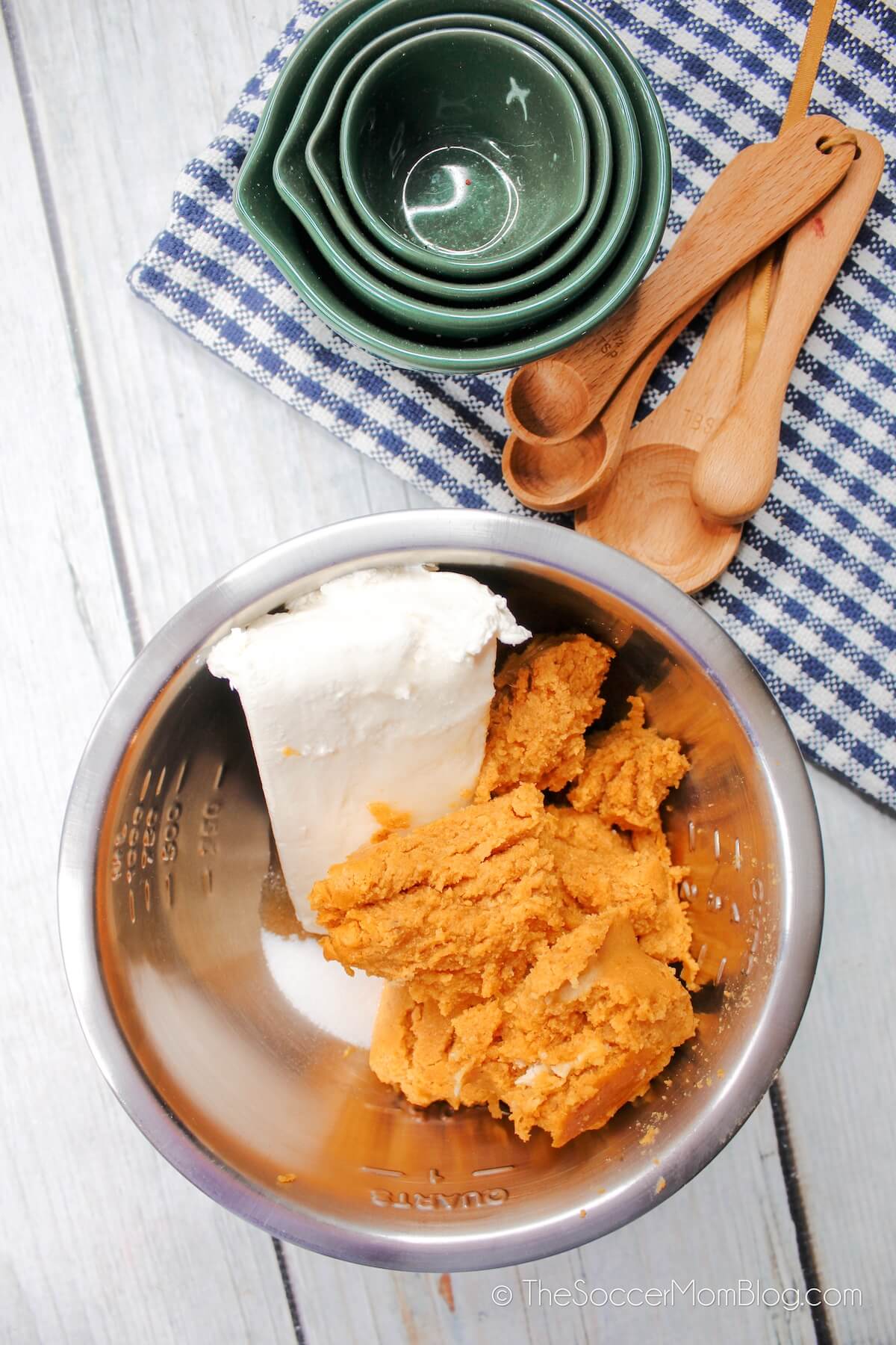 Cream Cheese and Pumpkin puree in a mixing bowl