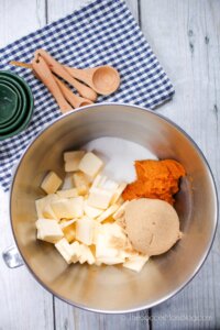 mixing bowl with pumpkin puree, sugars, and cubed butter