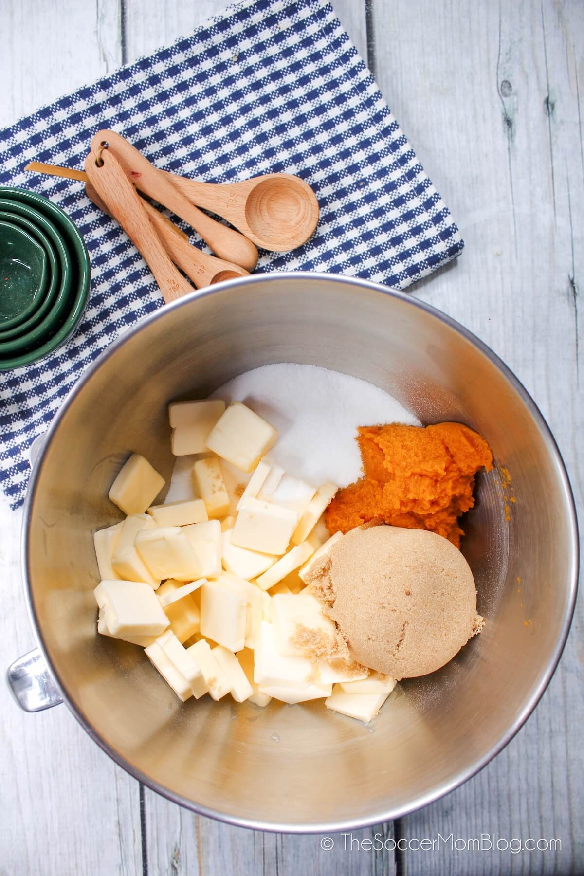 cubed butter, pumpkin, and sugar in a large mixing bowl