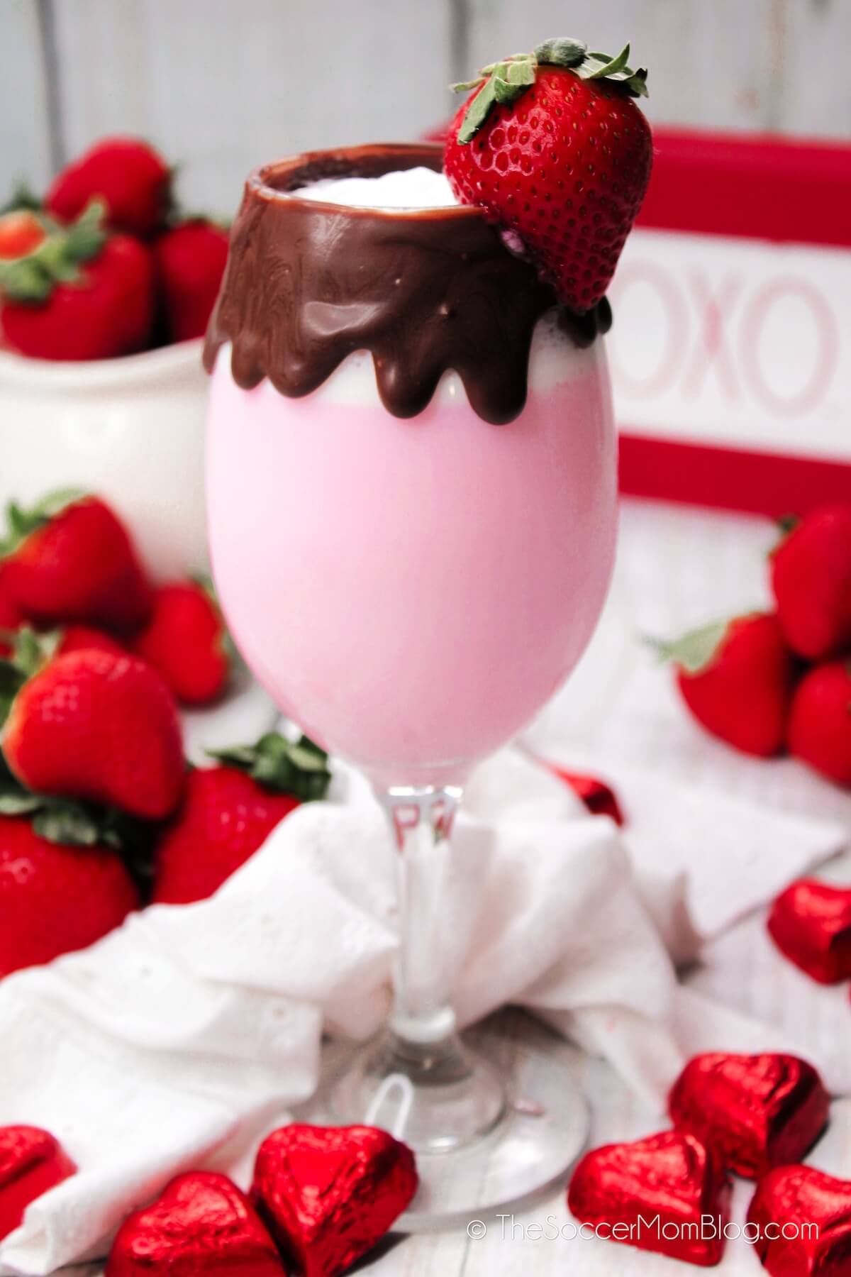 strawberries & cream cocktail in chocolate rimmed glass