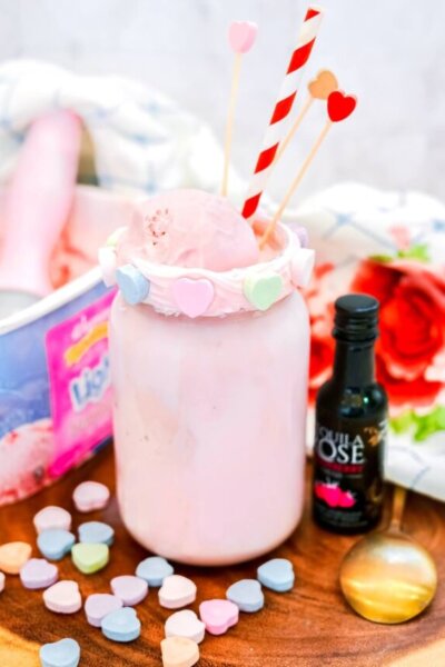 strawberry Valentine milkshake next to ice cream carton and tequila rose bottle
