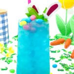 bright blue cocktail topped with jelly beans