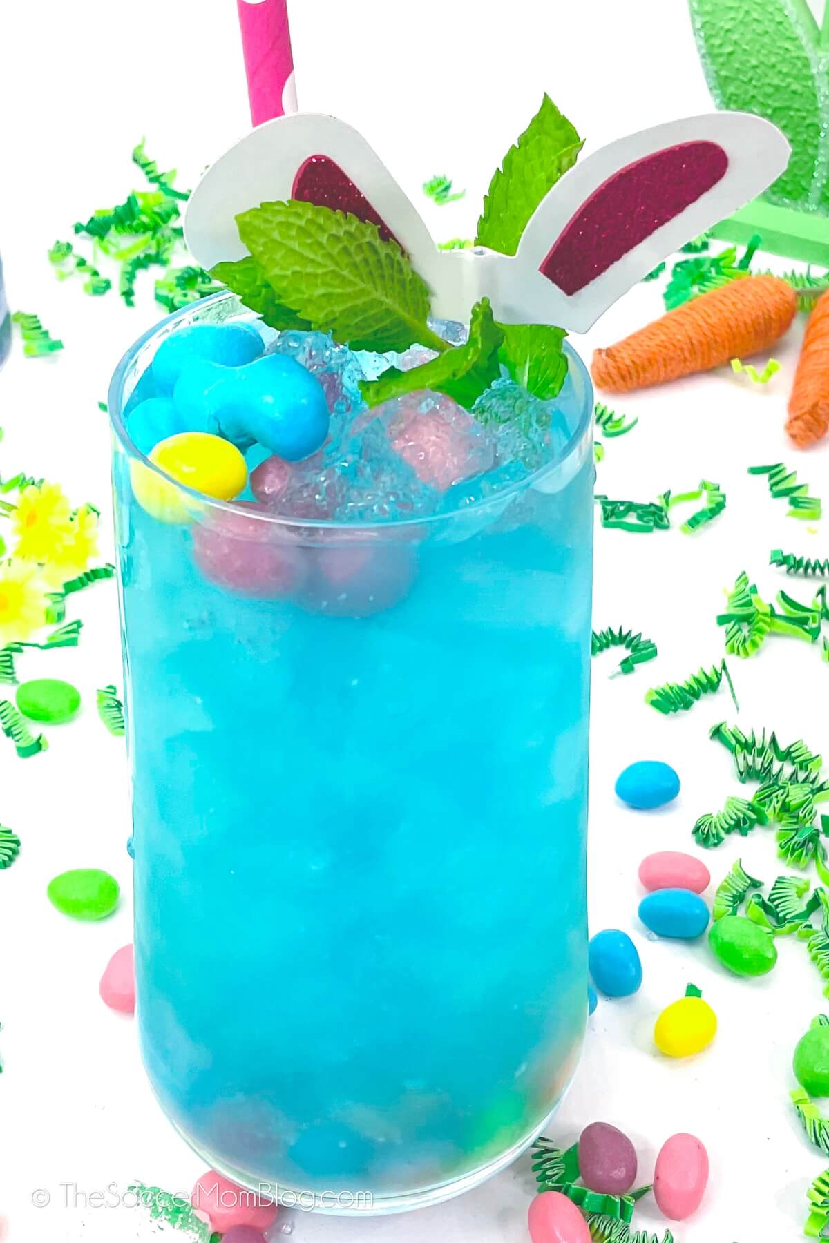 top down view of a blue Easter cocktail topped with jelly beans
