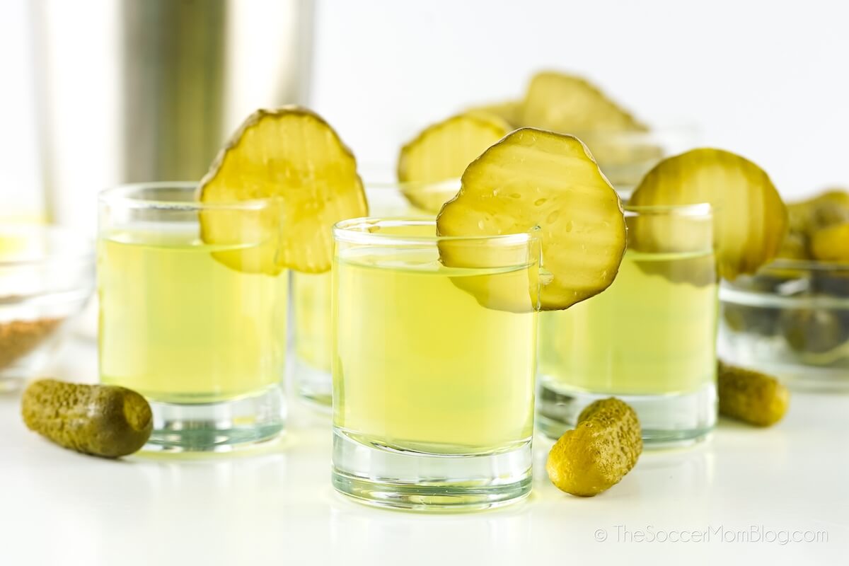 Dill Pickle Shots, surrounded by pickles