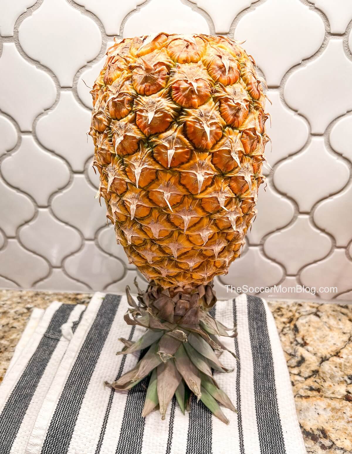 pineapple standing upside down on kitchen counter