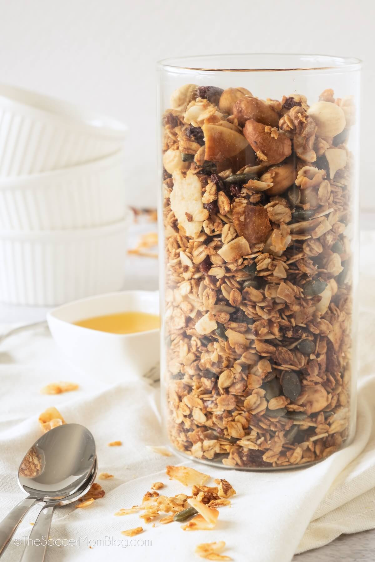 clear glass container of granola