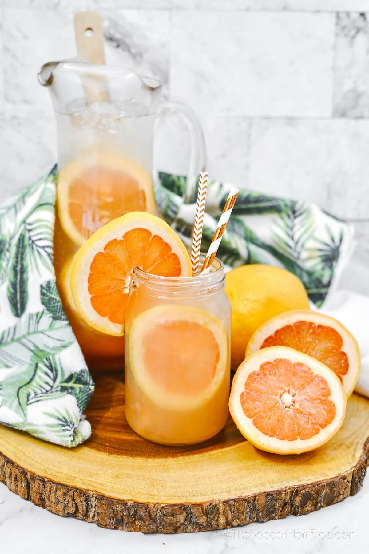 pitcher and single serving of grapefruit juice detox drink