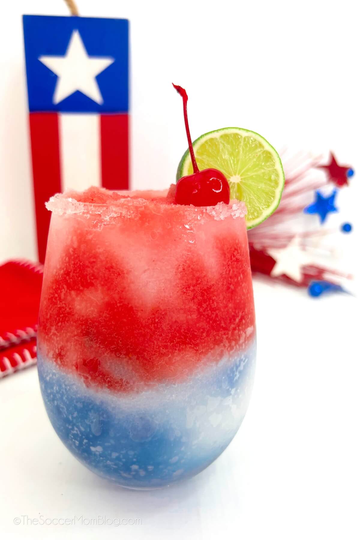 layered red white and blue frozen margarita with USA decor