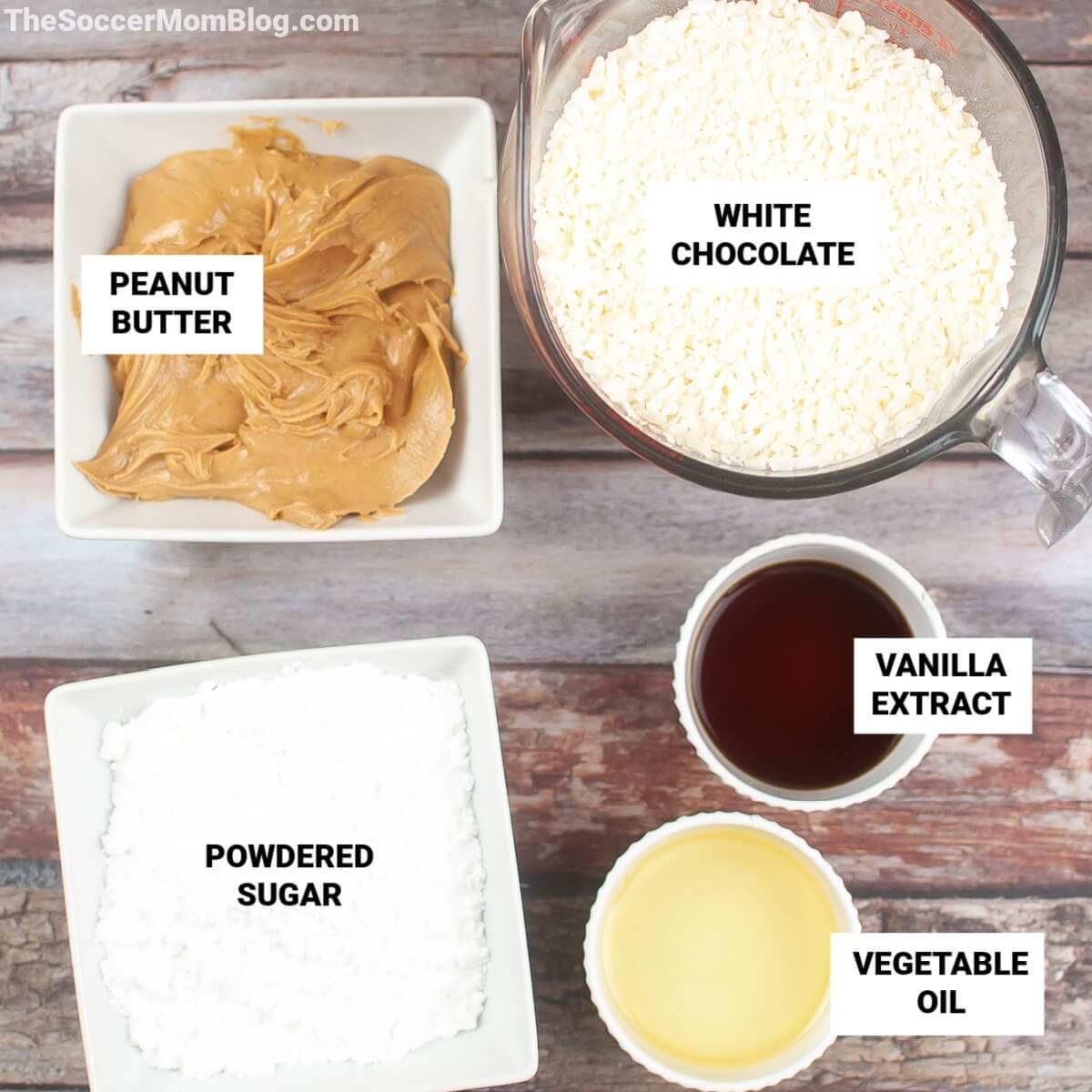 Ingredients for Reese's White Chocolate Peanut Butter Cups, with text labels (peanut butter, white chocolate, powdered sugar, vanilla, vegetable oil)