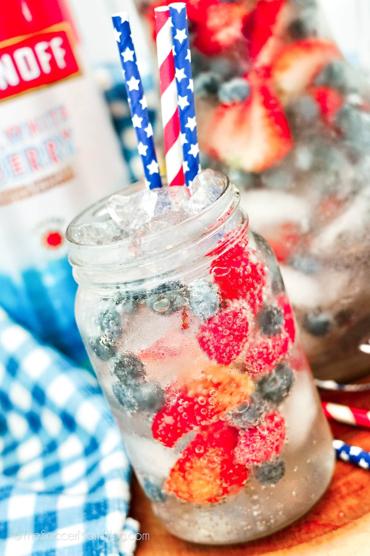 mason jar with a clear, bubbly berry punch