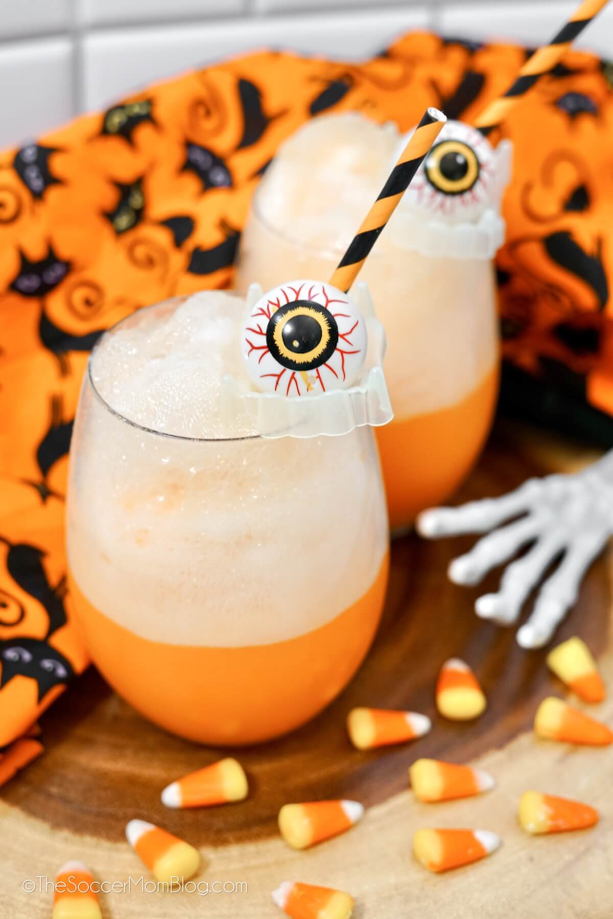 Halloween Floats made with orange soda and garnished with plastic eyeballs