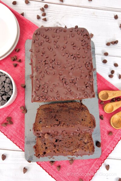 top -down photo of a loaf of brownie bread, surrounded by chocolate chips.