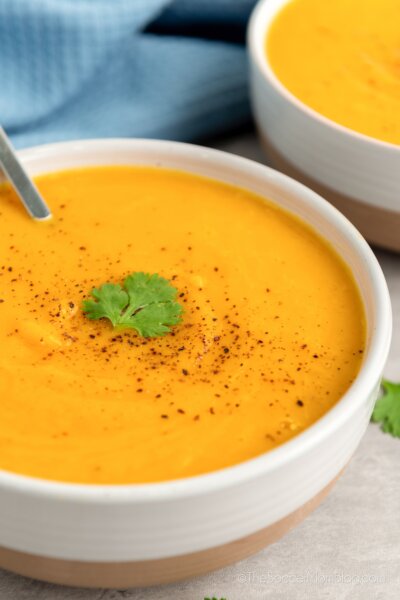 close up of a bowl of butternut squash soup.
