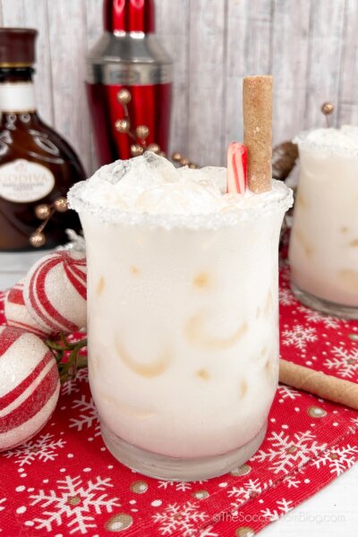 Christmas White Russian, garnished with peppermint sticks.
