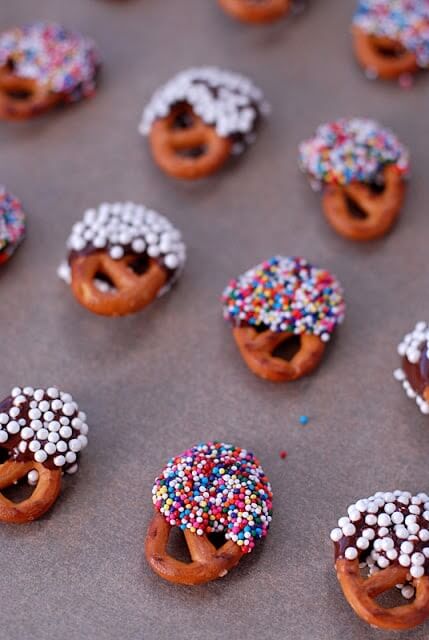 mini pretzel twists dipped in chocolate and sprinkles.