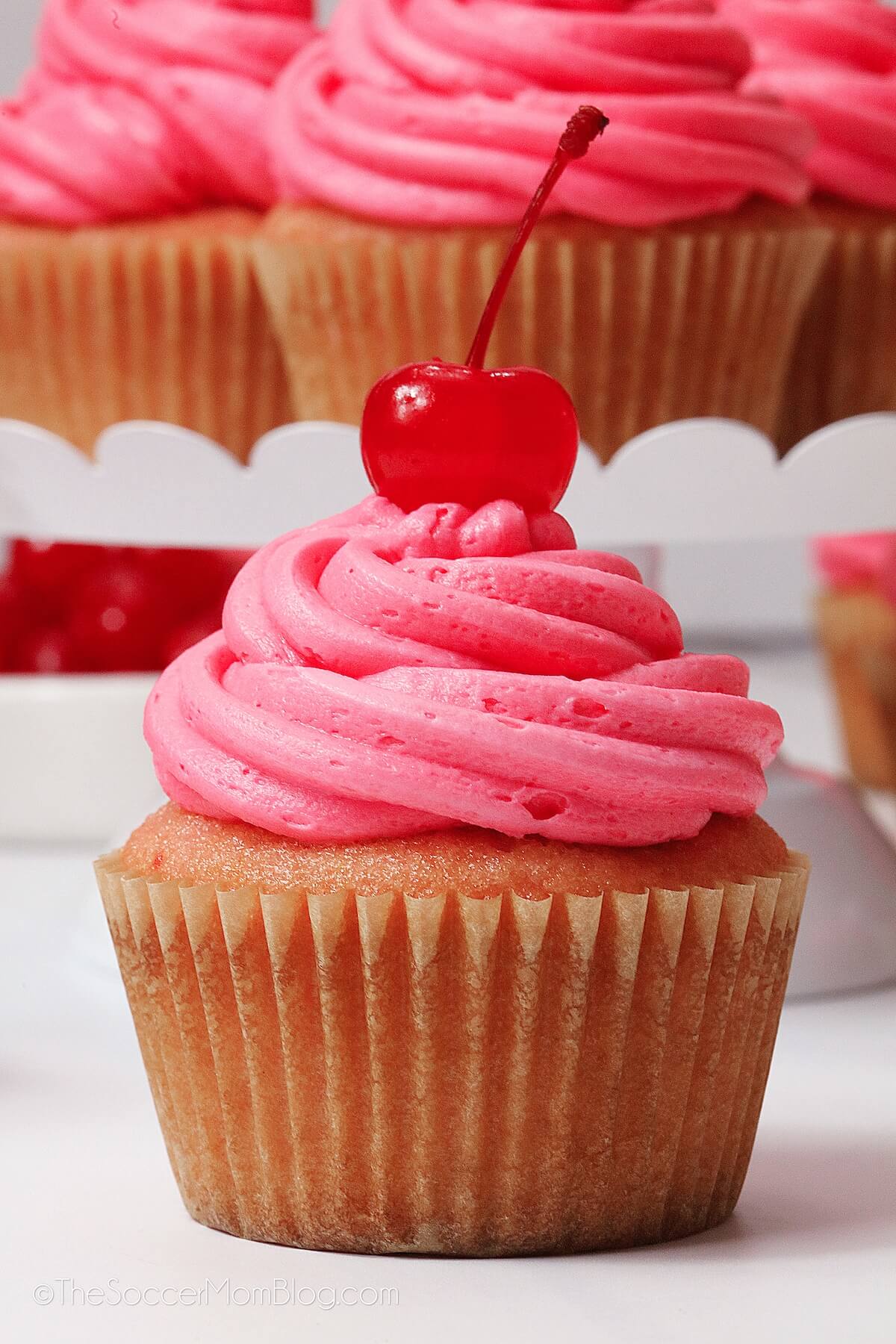 close up of a pink Cherry Cupcake.