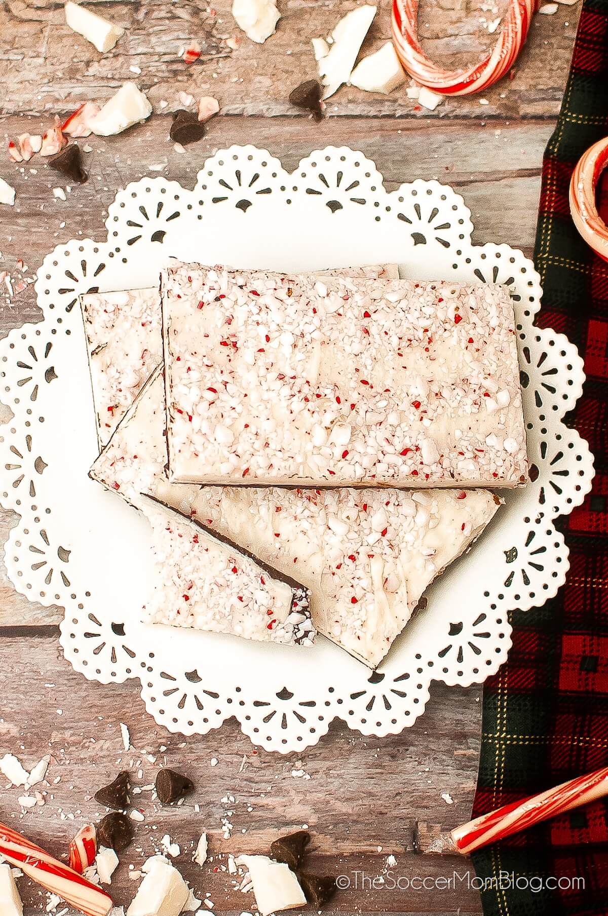 top-down view of a plate of peppermint bark candy.