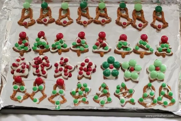 pretzels decorated to look like different Christmas shapes.