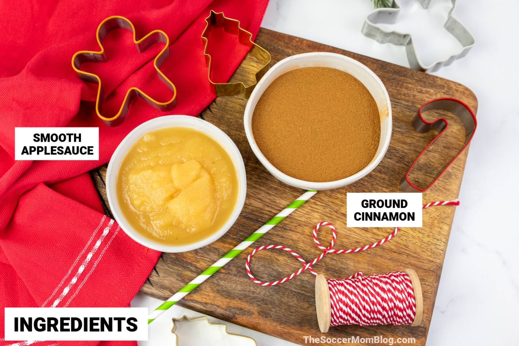 ingredients to make cinnamon ornaments: applesauce and ground cinnamon.